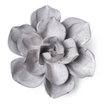 A ceramic Gardenia sculpture in a speckled light gray glaze, photographed from a top-down angle on a solid white background.