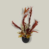 Top view of a magnificent 30" dried floral arrangement with autumn botanicals like helichrysum, dahlias, & oak leaves in a matte brown urn.