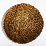 Round seagrass tray showing the intricate weave and structure from above  2