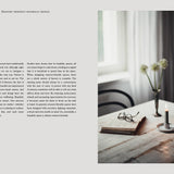Interior design book page with a photograph of a table setting.
