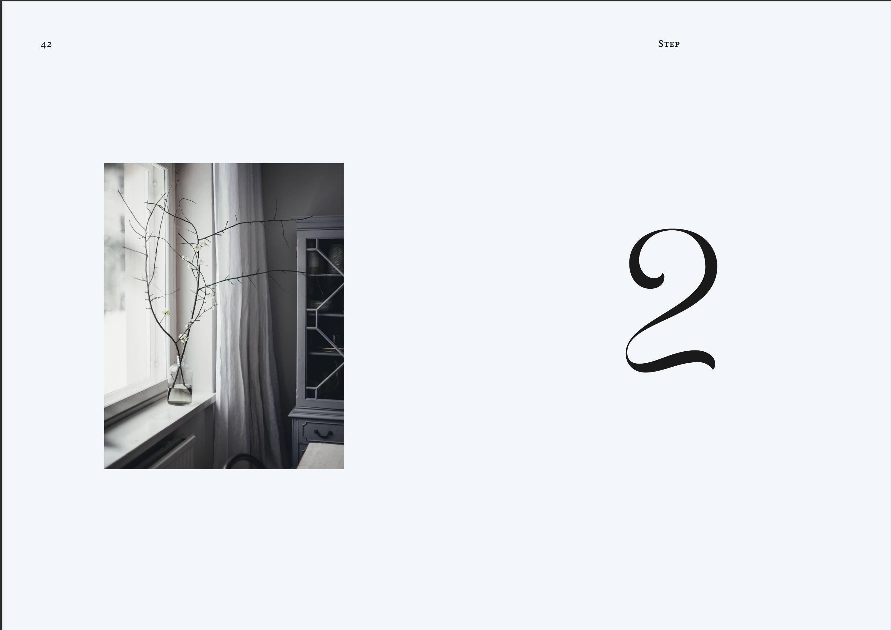 Page from a book or magazine with a number '2' and a small inset image of a room with a window and plant.