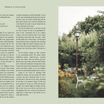 Book page with text on the left and a blurred outdoor scene on the right