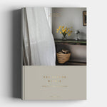 Book titled 'The Nature of Women' with a cover featuring a room interior.