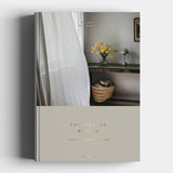 Book titled 'The Nature of Women' with a cover featuring a room interior.