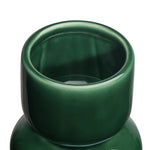 Close-up of the opening of a deep glossy green vase with sleek bulb shape on a white background.