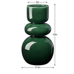 Deep glossy green vase with sleek bulb shape on a white background with dimensions of 10 inches tall, 5.5 inches in diameter at the bottom, and an opening of 3 inches in diameter. 