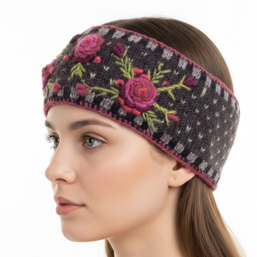Beautiful hand-knit headband with floral embroidery on a young woman