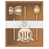 Set of matte gold bar tools including a jigger, spoon, strainer, and other utensils in a box with 'danies' branding.