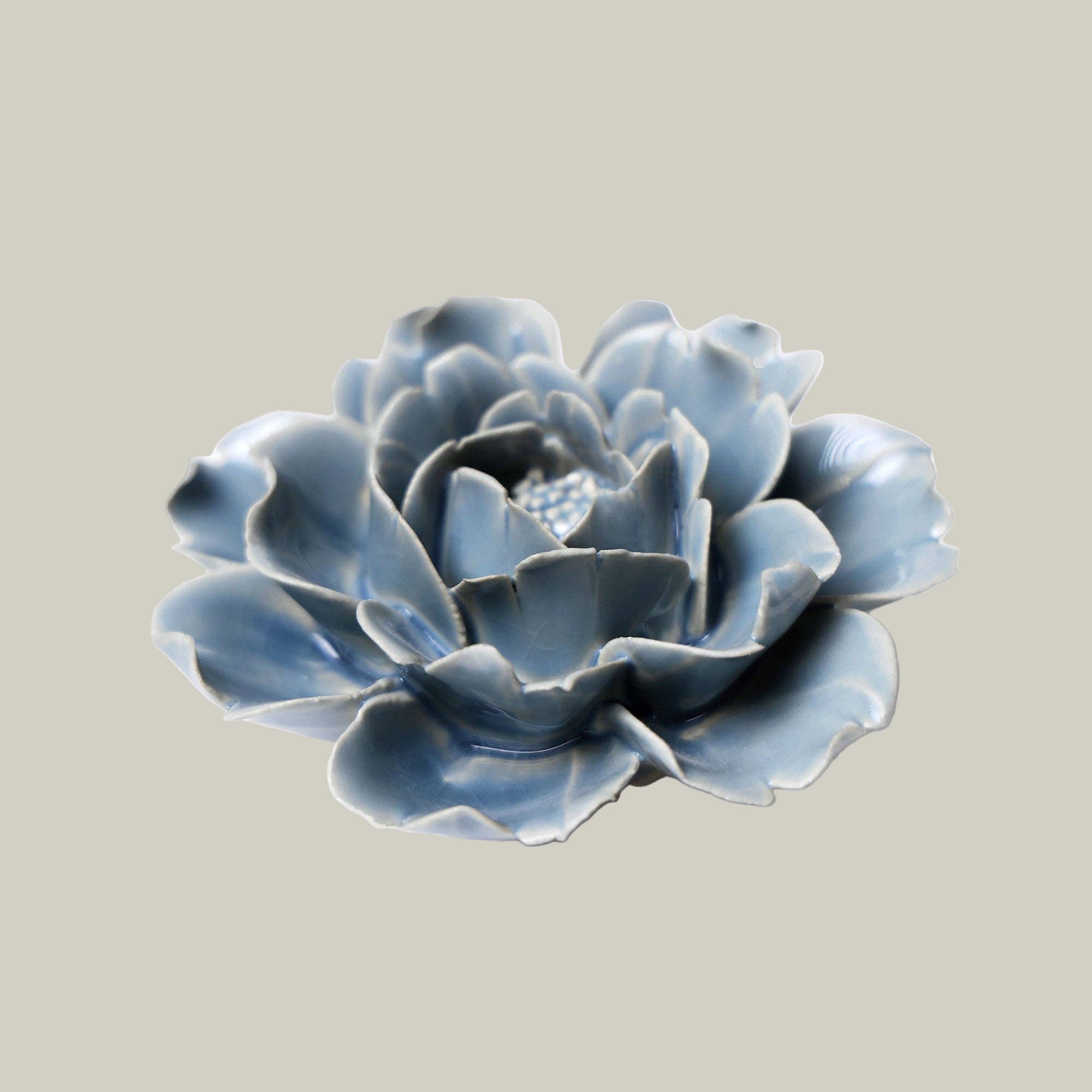 Blue ceramic flower sculpture of a Peony